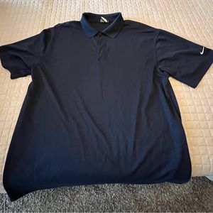 Nike golf polo. Large. Navy Blue w/ white Nike check.